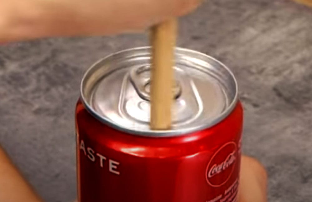 Open A Coke With A Stick @ 5-Minute Crafts GIRLY / Youtube.com