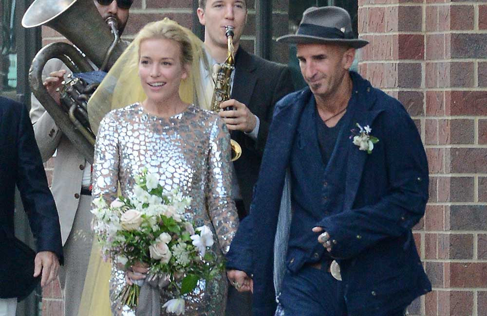 Actress Piper Perabo looked stunning for her wedding in New York City in a very unconventional gown created by Michael Kors.